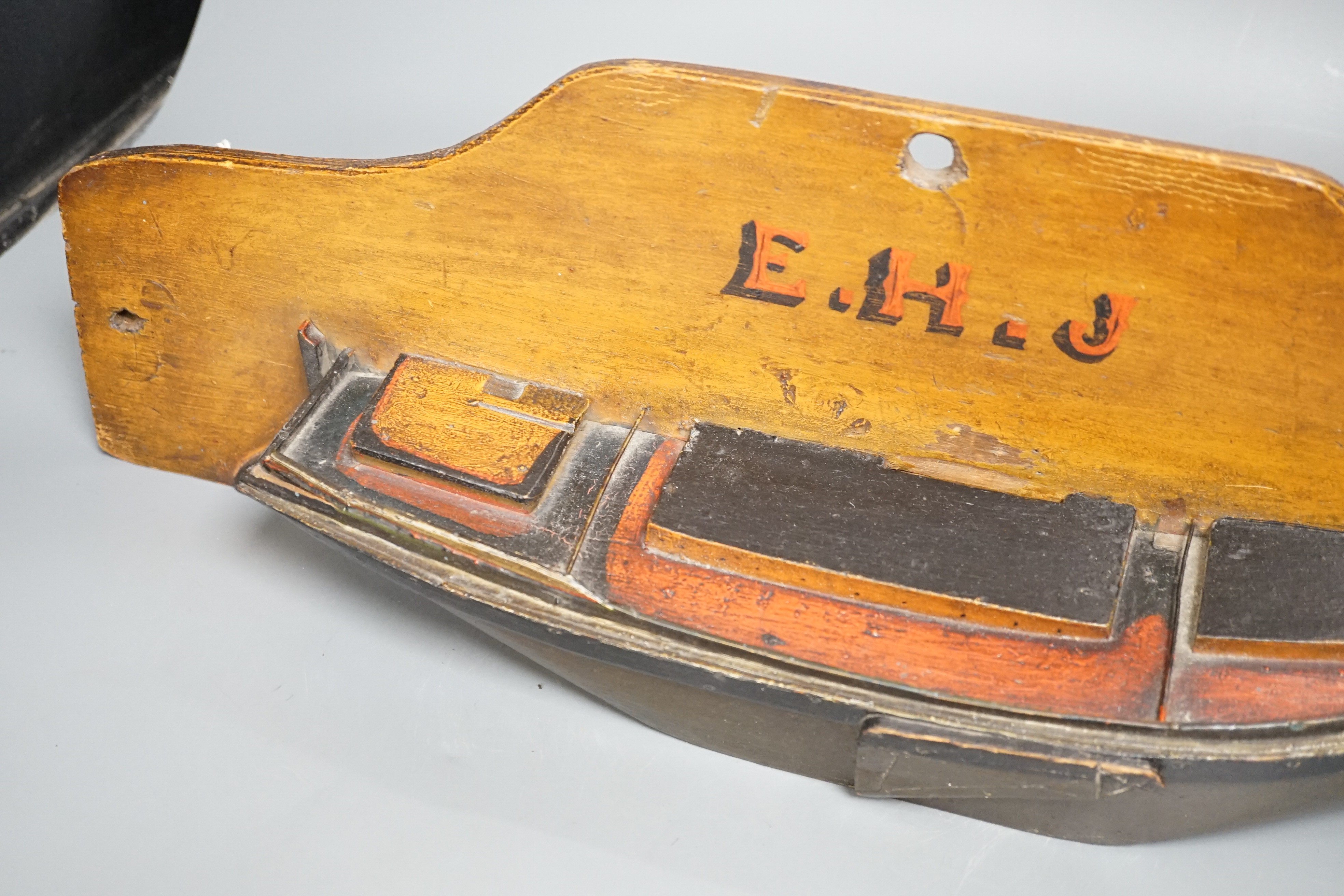 A painted wood half-block boat model ‘E.H.J’ 53.5cm